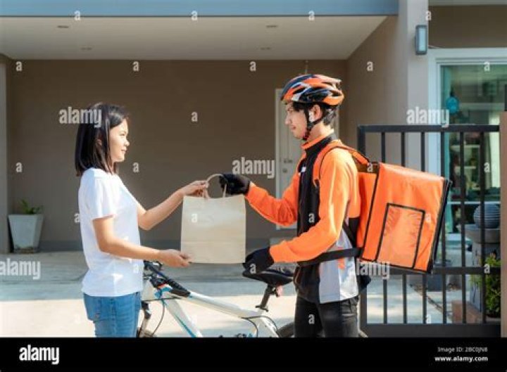 A man delivering a food order