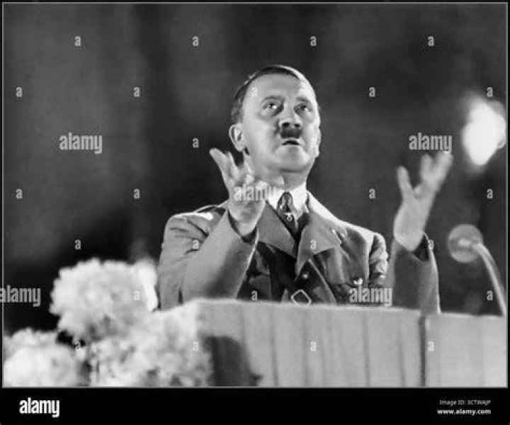Onni-Man giving a speech in his suit