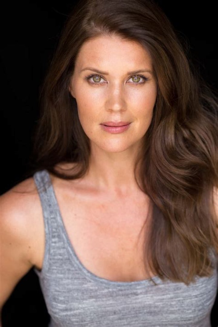 Sarah Lancaster posing for a photo (Source IMDb)