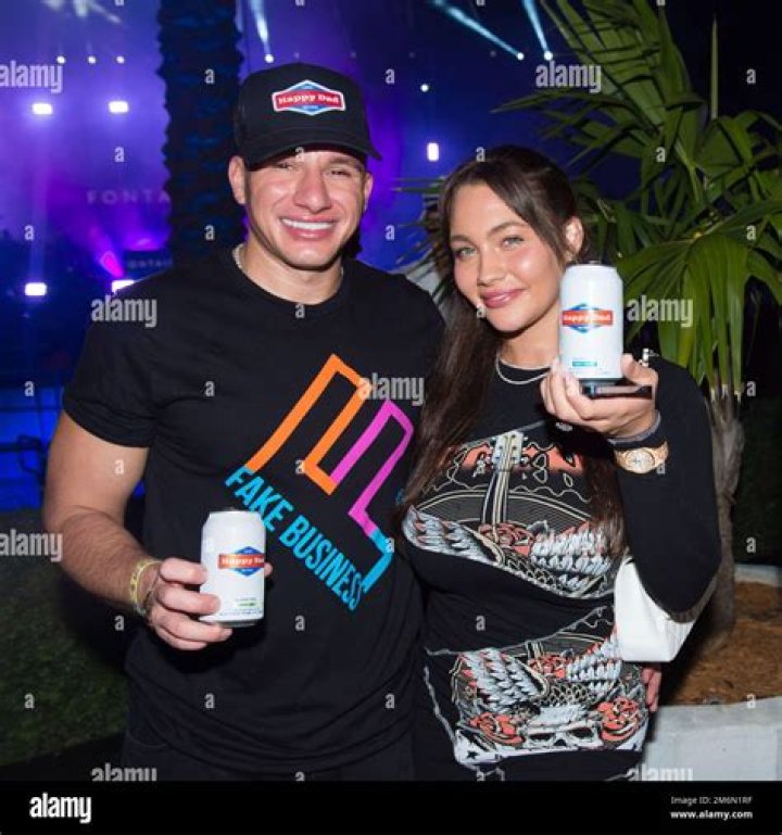 SteveWillDoIt and Celina Smith at an event